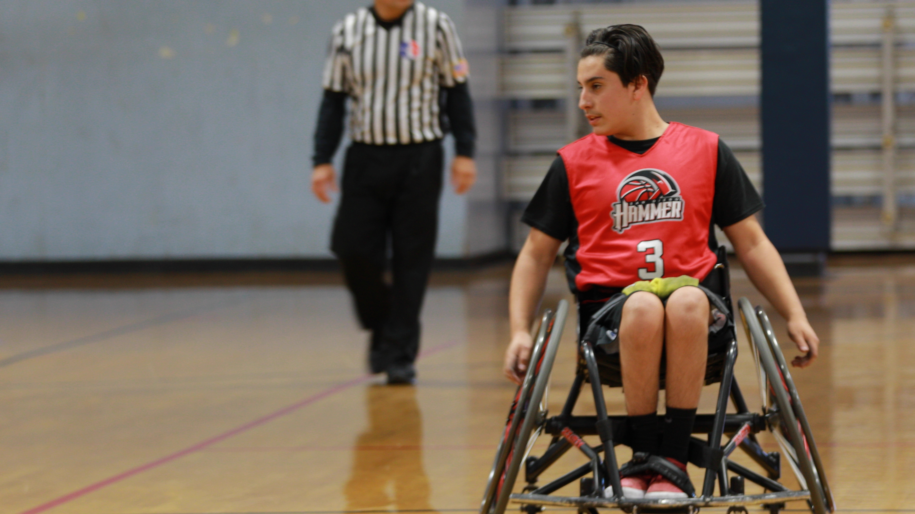 Danny playing wheelchair basketball at ASRA.